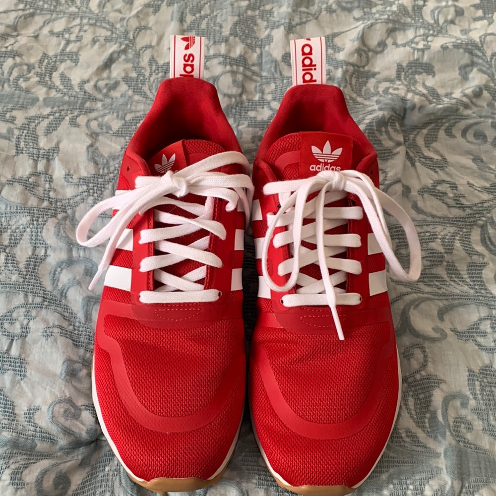 Adidas red sneakers size 8.5 (fits 9).